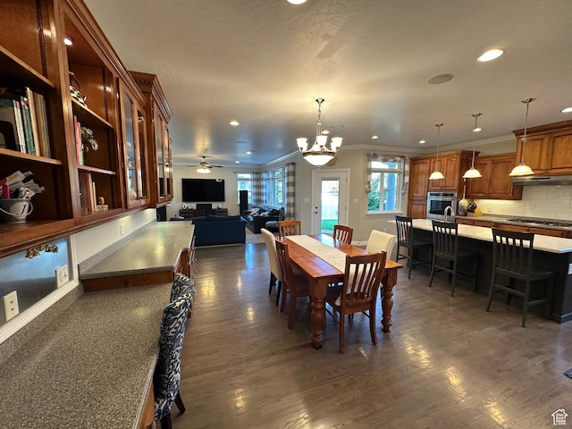 2662 N 1550 W, Pleasant Grove, UT 84062 - dining space with dark wood-style flooring, recessed lighting, ornamental molding, and ceiling fan