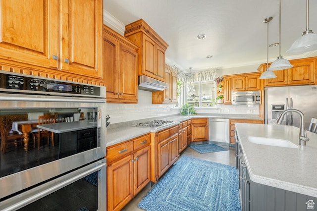 2662 N 1550 W, Pleasant Grove, UT 84062 - kitchen featuring stainless steel appliances, a sink, under cabinet range hood, tasteful backsplash, and hanging light fixtures