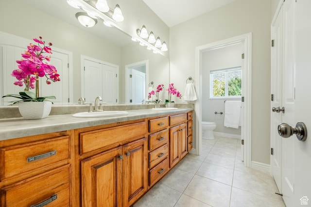 2662 N 1550 W, Pleasant Grove, UT 84062 - full bathroom featuring toilet, double vanity, tile patterned floors, and baseboards