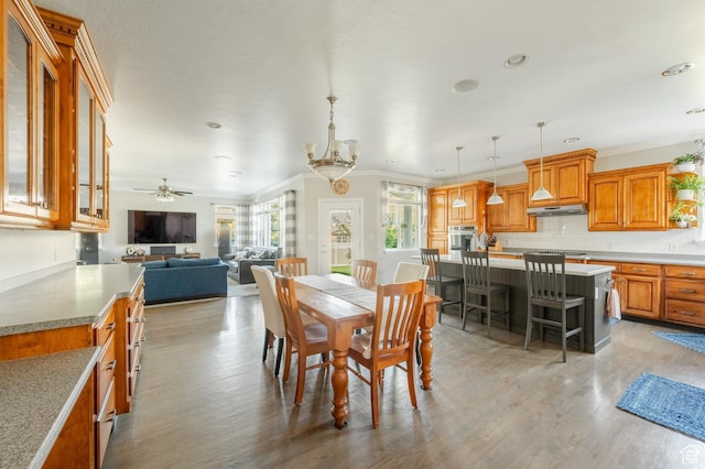 2662 N 1550 W, Pleasant Grove, UT 84062 - dining area featuring crown molding, light wood-style flooring, recessed lighting, and ceiling fan