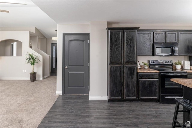 783 W 900 S, Tremonton, UT 84337 - kitchen featuring dark wood-style floors, black appliances, dark cabinetry, and baseboards