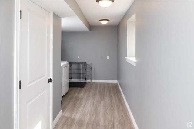 783 W 900 S, Tremonton, UT 84337 - corridor with washer / dryer, light wood-style floors, and baseboards