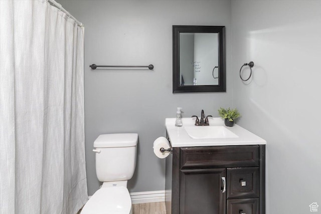 783 W 900 S, Tremonton, UT 84337 - full bathroom with vanity, curtained shower, toilet, and baseboards