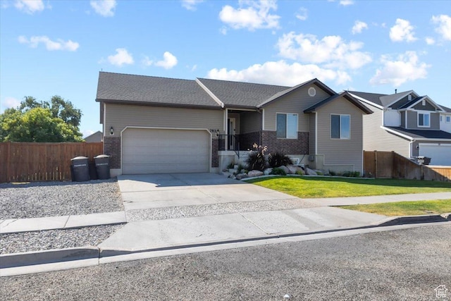 783 W 900 S, Tremonton, UT 84337 - ranch-style home featuring a front yard, concrete driveway, an attached garage, and fence