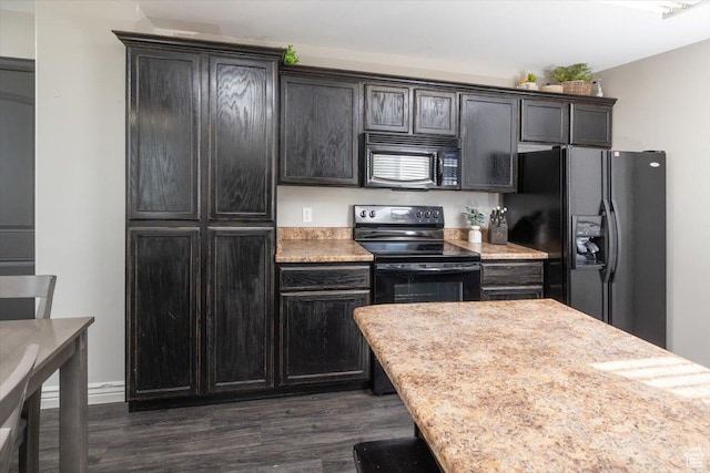 783 W 900 S, Tremonton, UT 84337 - kitchen featuring dark wood finished floors, black appliances, and light countertops