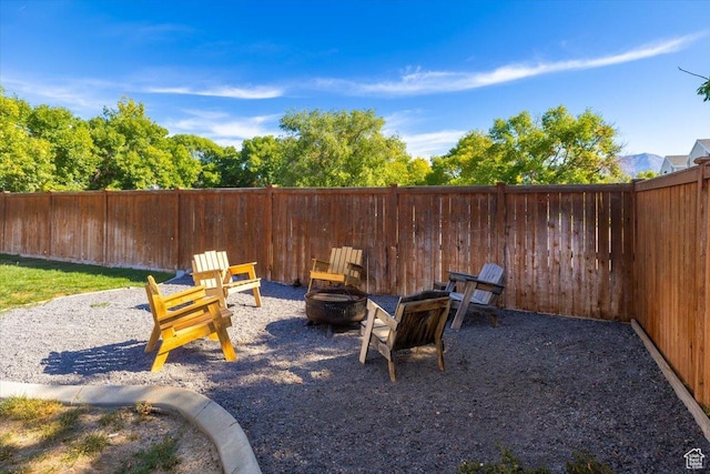 783 W 900 S, Tremonton, UT 84337 - view of patio / terrace featuring a fenced backyard and an outdoor fire pit