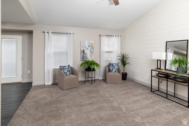 783 W 900 S, Tremonton, UT 84337 - living area with carpet, vaulted ceiling, wood finished floors, and baseboards