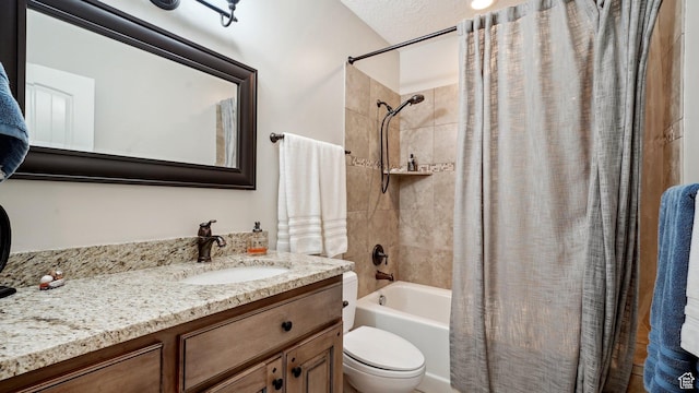 full bathroom with vanity, toilet, and shower / bath combo