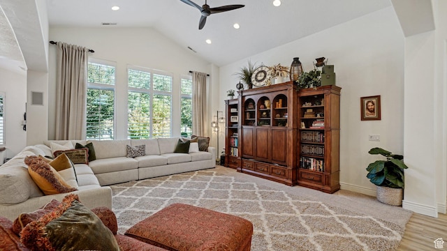 living room with wood finished floors, high vaulted ceiling, visible vents, recessed lighting, and ceiling fan