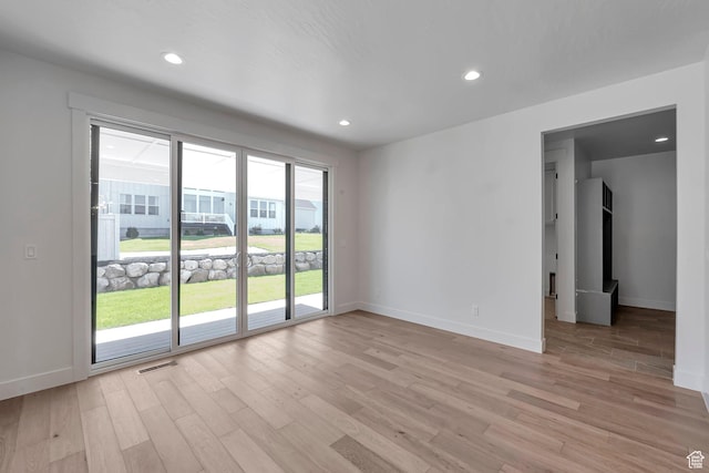 731 W Sara Dr, Saratoga Springs, UT 84045 - empty room featuring light wood-type flooring, baseboards, and recessed lighting