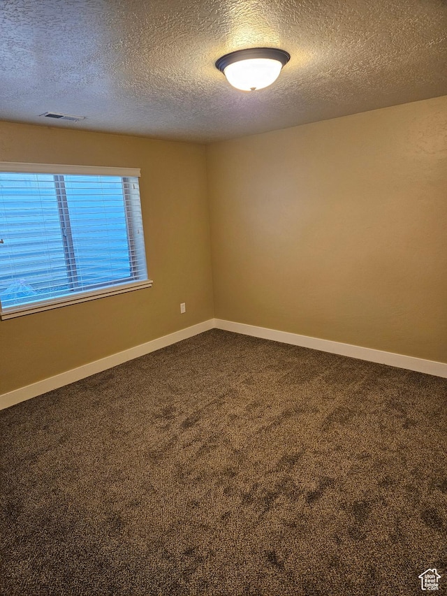 772 S 150 E, Smithfield, UT 84335 - carpeted spare room with a textured ceiling, visible vents, and baseboards