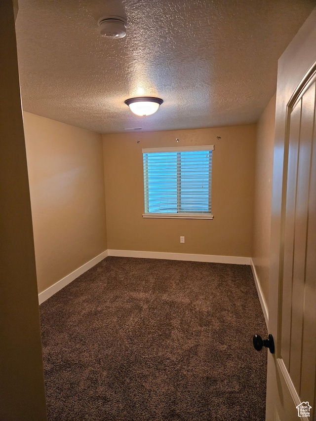 772 S 150 E, Smithfield, UT 84335 - carpeted spare room featuring a textured ceiling and baseboards