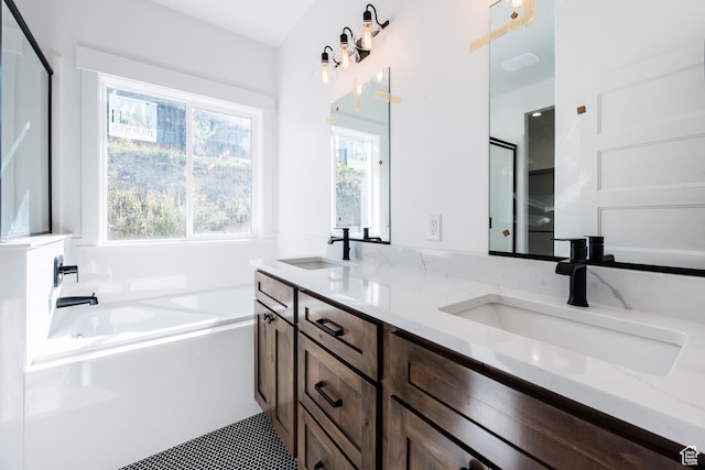 110 S 950 E Unit 45, Hyde Park, UT 84318 - bathroom with plus walk in shower, tile patterned floors, and vanity