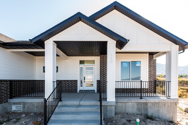 110 S 950 E Unit 45, Hyde Park, UT 84318 - doorway to property featuring covered porch