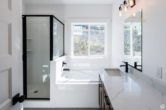 110 S 950 E Unit 45, Hyde Park, UT 84318 - bathroom featuring shower with separate bathtub and vanity