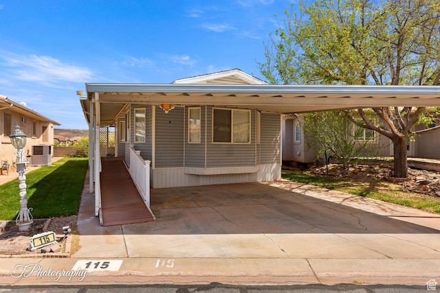 view of front of property with an attached carport