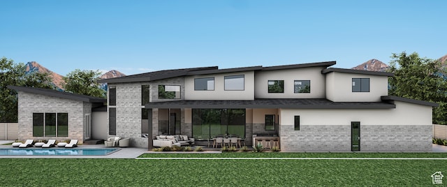 13941 S Jarvie Ln, Draper, UT 84020 - rear view of house featuring outdoor lounge area, a patio area, and a lawn