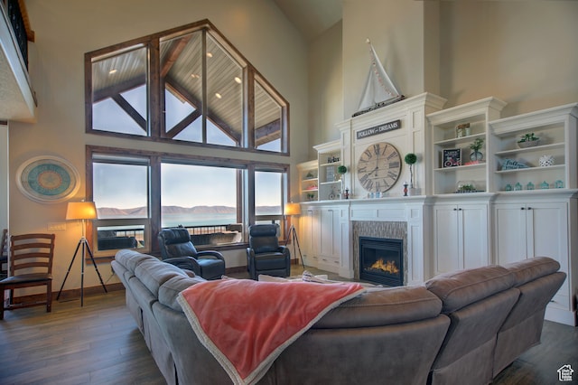 86 Aster Pl, Fish Haven, ID 83287 - living room featuring dark hardwood / wood-style flooring and high vaulted ceiling
