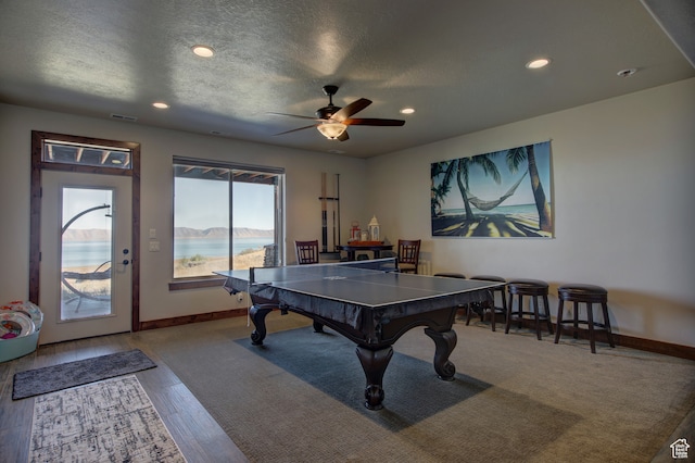 86 Aster Pl, Fish Haven, ID 83287 - rec room with ceiling fan, hardwood / wood-style flooring, and a textured ceiling