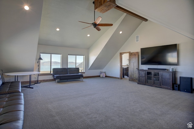 86 Aster Pl, Fish Haven, ID 83287 - carpeted living room with ceiling fan, beamed ceiling, and high vaulted ceiling