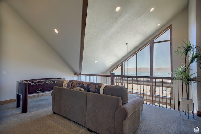 86 Aster Pl, Fish Haven, ID 83287 - carpeted living room with vaulted ceiling and a water view