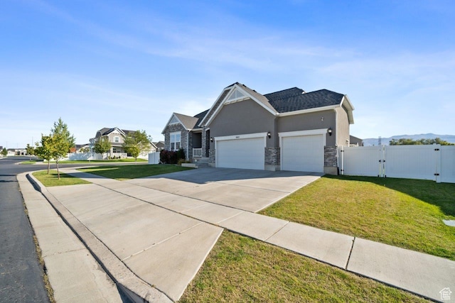 665 S 1400 W, Syracuse, UT 84075 - view of front of property featuring a front yard, a garage, fence, concrete driveway, and a gate