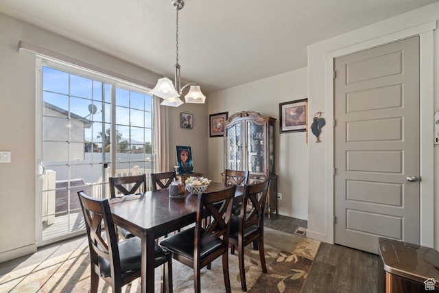 665 S 1400 W, Syracuse, UT 84075 - dining area featuring light wood-style floors, baseboards, and an inviting chandelier