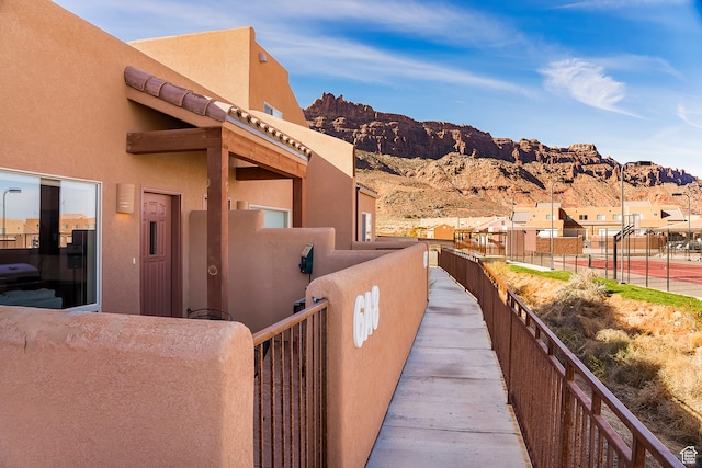 view of home's exterior with a mountain view