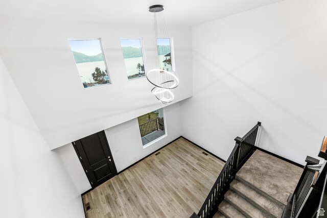 2867 S Greenhead Dr, Saratoga Springs, UT 84045 - foyer entrance featuring a water view and light wood finished floors