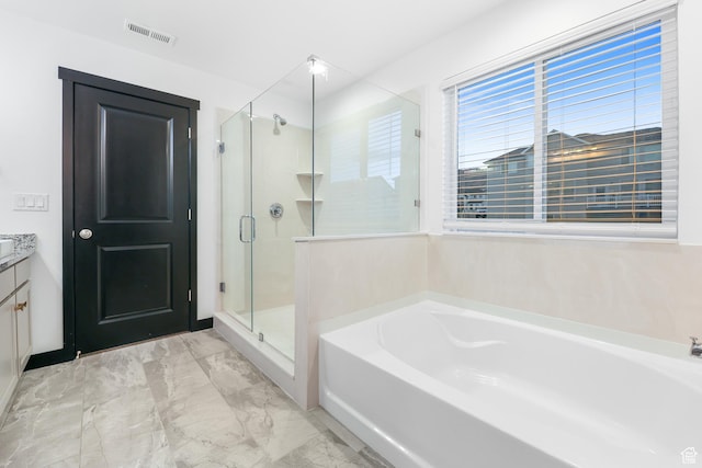 2867 S Greenhead Dr, Saratoga Springs, UT 84045 - bathroom featuring a bath, vanity, visible vents, marble finish floor, and a stall shower