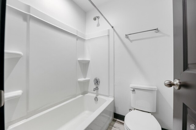 2867 S Greenhead Dr, Saratoga Springs, UT 84045 - full bath with toilet, baseboards, and shower / bathtub combination