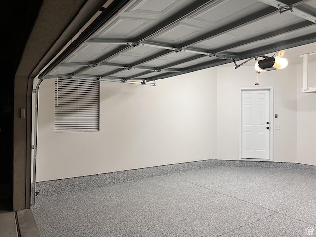 6912 S Village Haven Ln, Midvale, UT 84047 - garage featuring a garage door opener