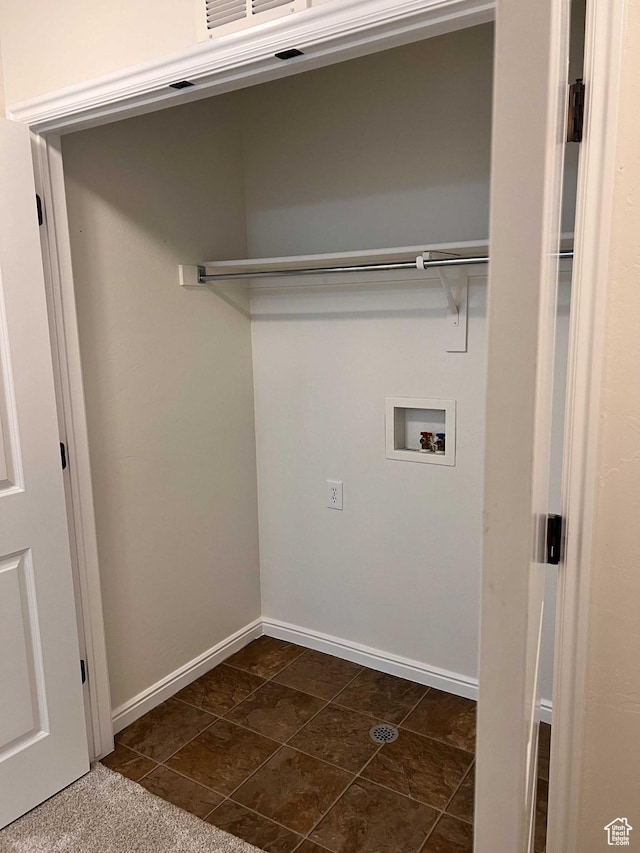 6912 S Village Haven Ln, Midvale, UT 84047 - laundry room featuring dark tile patterned flooring and washer hookup