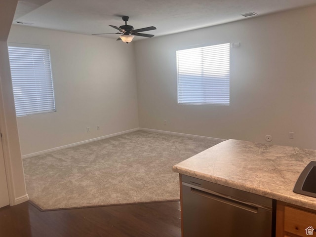 6912 S Village Haven Ln, Midvale, UT 84047 - spare room with dark colored carpet, ceiling fan, and sink