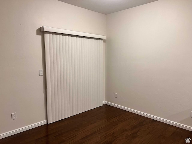 6912 S Village Haven Ln, Midvale, UT 84047 - spare room featuring dark wood-type flooring
