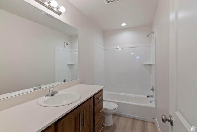 1696 S Windsong Dr Unit 362, Santaquin, UT 84655 - full bathroom featuring wood-type flooring, shower / tub combination, vanity, and toilet