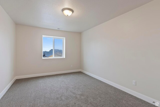 1696 S Windsong Dr Unit 362, Santaquin, UT 84655 - unfurnished room with a textured ceiling and carpet