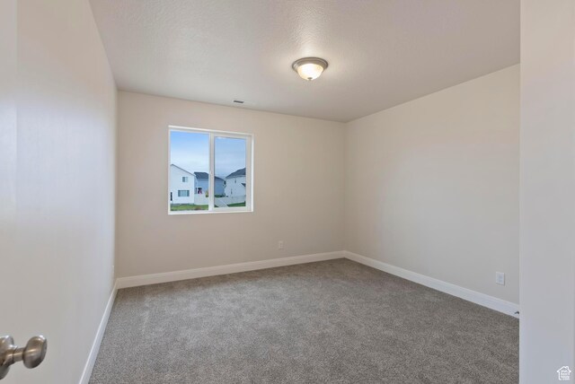 1696 S Windsong Dr Unit 362, Santaquin, UT 84655 - empty room featuring a textured ceiling and carpet