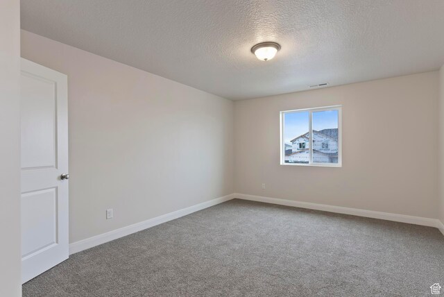1696 S Windsong Dr Unit 362, Santaquin, UT 84655 - carpeted empty room with a textured ceiling
