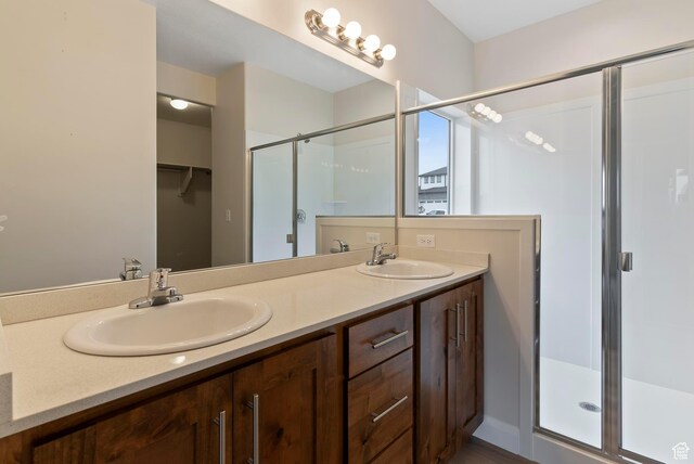 1696 S Windsong Dr Unit 362, Santaquin, UT 84655 - bathroom featuring vanity and a shower with shower door
