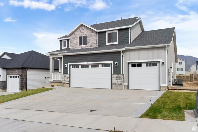 1696 S Windsong Dr Unit 362, Santaquin, UT 84655 - view of front of home with central air condition unit and a garage