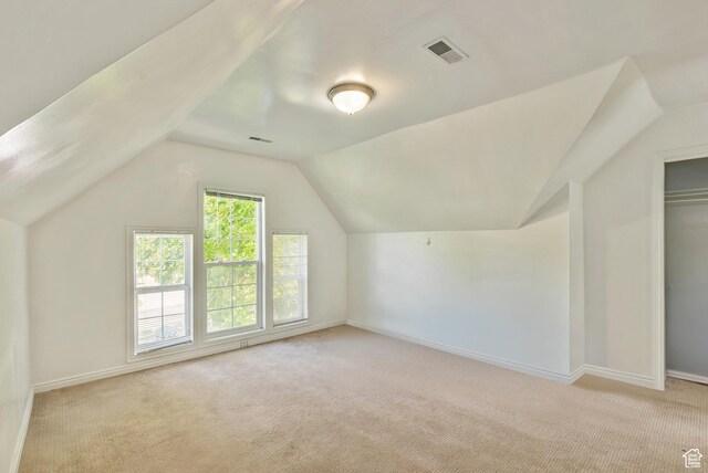 48 E 200 N, Salt Lake City, UT 84103 - additional living space featuring baseboards, vaulted ceiling, and carpet floors