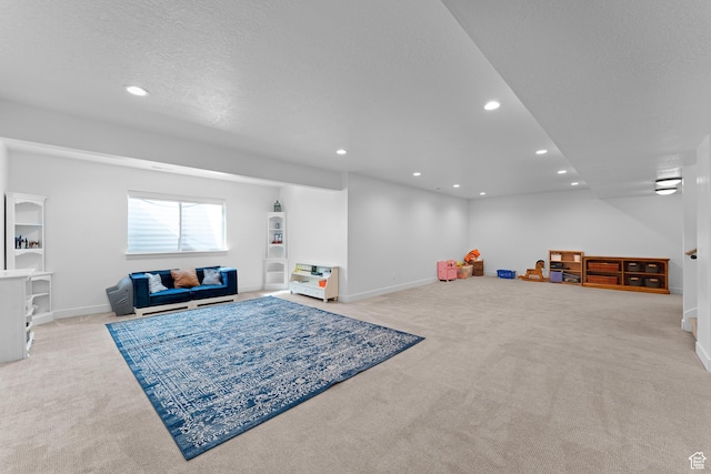 game room featuring baseboards, recessed lighting, and carpet