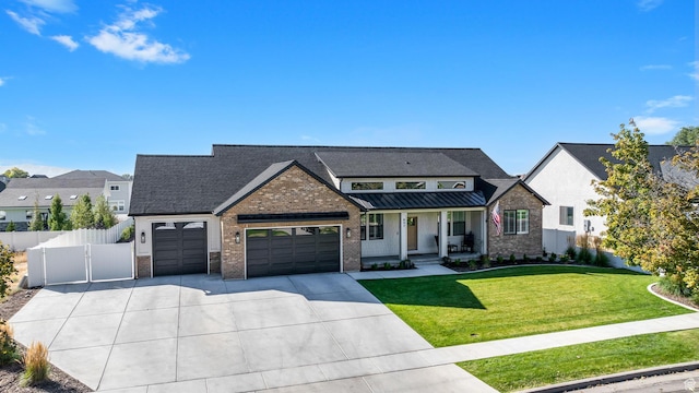 view of front facade with driveway, an attached garage, fence, a porch, and brick siding