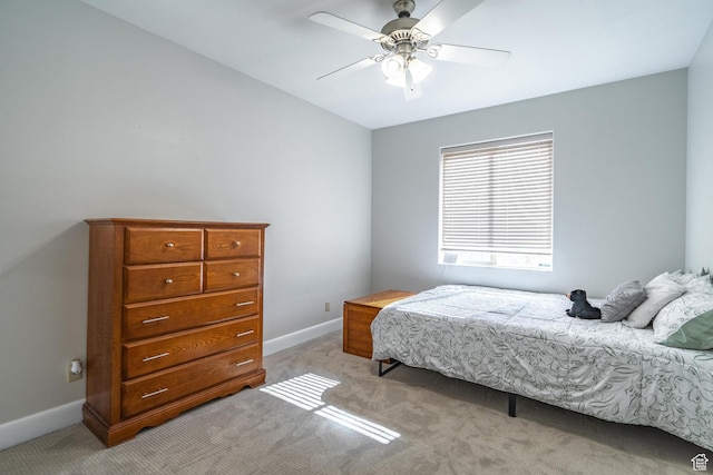 2042 Westcliff Dr, St George, UT 84790 - bedroom featuring a ceiling fan, baseboards, and light colored carpet