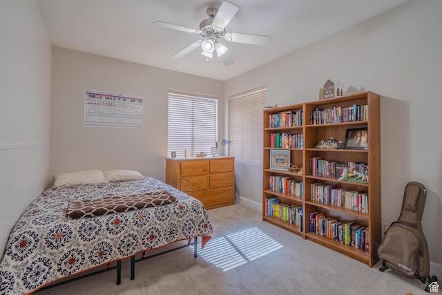 2042 Westcliff Dr, St George, UT 84790 - bedroom with light colored carpet, baseboards, and a ceiling fan