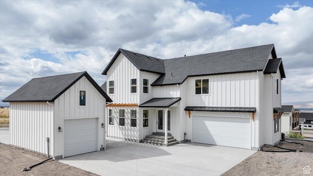 1153 E 160 N, Hyde Park, UT 84318 - modern farmhouse with board and batten siding, a standing seam roof, and a shingled roof