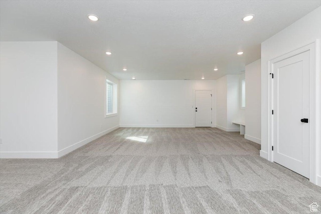 1153 E 160 N, Hyde Park, UT 84318 - unfurnished room with baseboards, light carpet, and recessed lighting