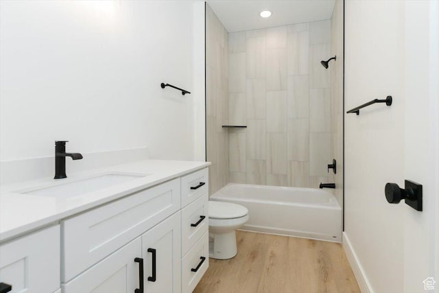 1153 E 160 N, Hyde Park, UT 84318 - bathroom featuring wood finished floors, recessed lighting, vanity, toilet, and bathing tub / shower combination