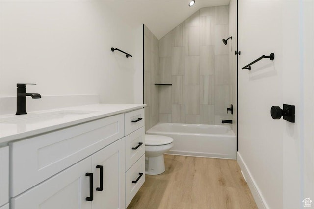 1153 E 160 N, Hyde Park, UT 84318 - full bathroom with vaulted ceiling, wood finished floors, vanity, shower / bath combination, and toilet
